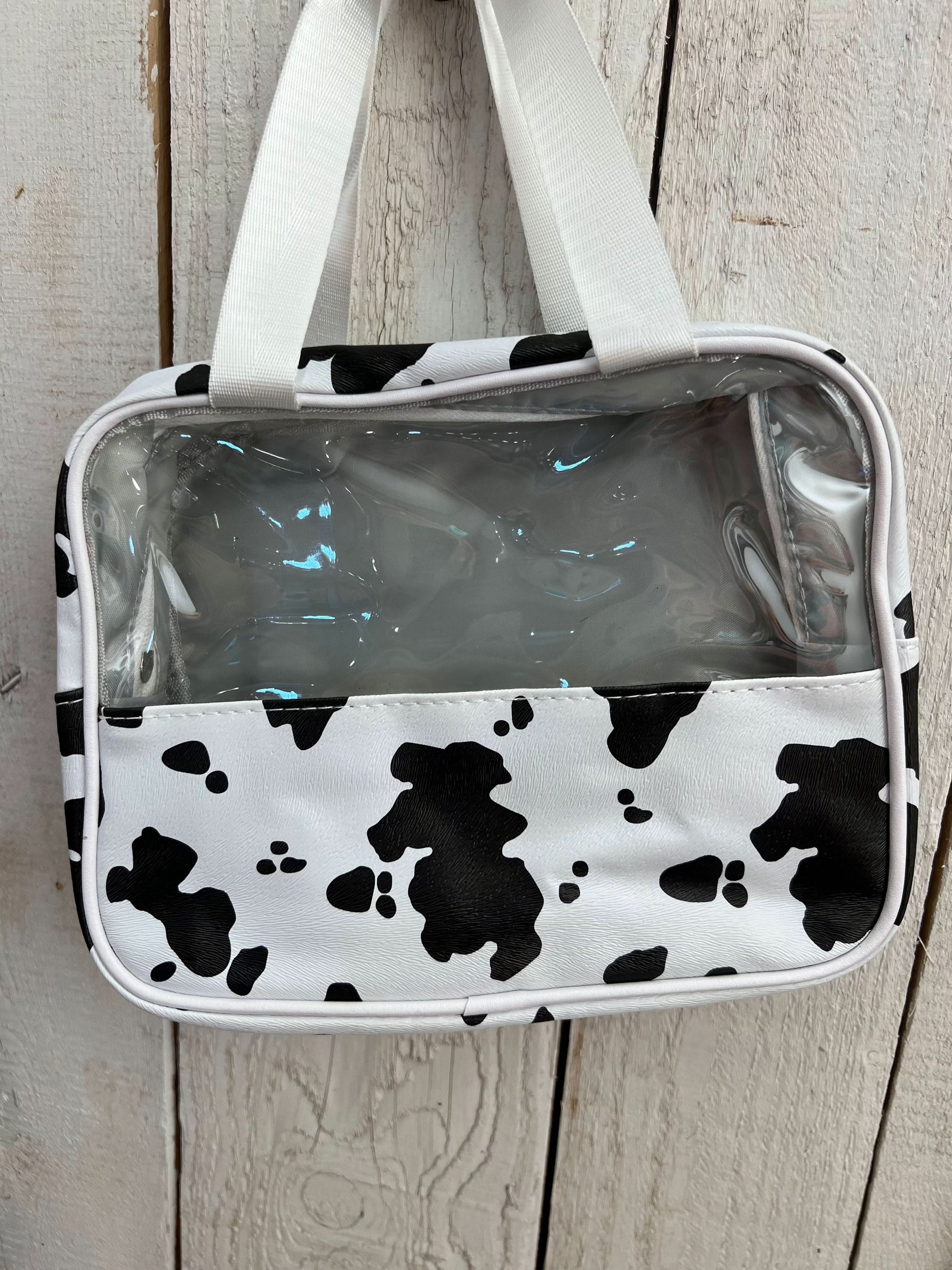 Makeup bag with plastic cowprint